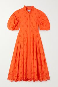 Erdem's 'Zelda' dress is a highlight from the Resort '23 collection. Made from crisp poplin in a vivid 'Clementine' hue, it's embroidered with tonal flowers and has pretty scalloped broderie anglaise detailing the collar and hem. The gathered puffed sleeves and pleated inserts through the skirt create dramatic volume, nodding to '50s couture. Mirror the presentation styling by cinching your waist with a black belt.