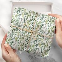 AD: Elegant winter botanical tissue paper featuring a pattern of leaves and foliage in various shades of light and dark green. Designed by Late Bloom Paperie for Zazzle.