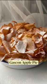 25min · 6 servings     gascon apple pie / gascon pastis 🍏 . elegant vegan dessert that is delicious   ingredients  • 5-6 apples, golden delicious is good  • 3 tbsp caster sugar  • 50ml Armagnac (or another cognac/brandy)  • Juice of one small lemon  • Many layers of filo/phyllo, maybe a whole pack  • ~50ml melted butter or margarine or vegetable spread  Instructions:  • 1. Preheat oven to 350 F / 175 C  • 3. Peel and core apples, slice thinly.  • 4. Place in a bowl, sprinkle with sugar, liquor, lemon juice. Mix and leave to sit for ~20 minutes.   • 5. Butter pie tin ~20cm/, butter 4 layers of filo and lay at bottom of pie tin. Bake for ~10 minutes until just cooked.   • 6. Remove juice from apples (you can reduce this to a syrup) and add layer apples in pastry  • 7. Butter more sheets of