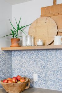 Blue and White Tile Backsplash in Neutral Cottage Kitchen