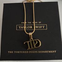 Gold Taylor Swift TTPD Departments necklace #TaylorSwift #TaylorSwiftMerch