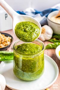 Whether dipping into french bread, or topping pasta, you will absolutely love how easy and flavorful this Homemade Pesto Recipe is.