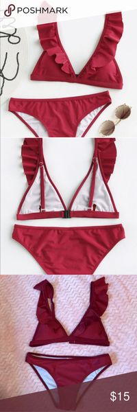 Red Bikini two piece maroon swimsuit LOVE this bikini! ❤️ Thought it would fit & it’s too small! 😫  Maroon red color.  New in plastic package.   No trades. Bundle 2 or more items from my closet & save 15% off your purchase! 🎉 Swim Bikinis