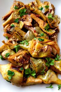 Golden Brown Artichokes Braised in White Wine Recipe | Italian Food Forever