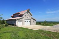 Post & Beam Wood Barn built for a work shop and features an open loft | Sand Creek Post & Beam #woodbarn #greystain