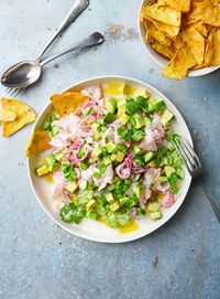 I like to serve a bowl of corn chips for scooping up this fresh and light ceviche. Perfect as a light meal or snack.