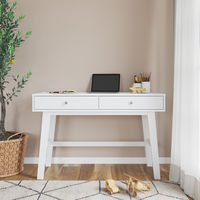 Bring a touch of mid-century modern styling to your child's workspace with the Soho Desk. This study desk features a compact design with clean lines and canted legs. 2 spacious drawers provide a place to store office or art supplies. The wide desktop is perfectly sized for your child's laptop or craft activities. Available in 2 neutral finishes, the Soho kid's desk will compliment any bedroom, office, or craft room style. This table can also be used as a TV unit, console table, or workspace.