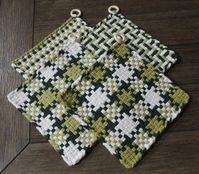 Handmade large loom woven potholder or trivet made with cotton loops.  Potholders are 8"x8" with a wooden hanging loop.  Handwash or machine wash in cold water.  Hang or dry flat.    Colors are:   pine, leaf and white. The potholders are durable and handmade by me.  If you would like specific colors, please message me and I can make one to order.  Please check out the other colors and patterns in my shop.