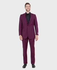 This smartly plum tailored business suit for men has a professional look combined with modern detailing. Wear as a men's church suit to a wedding or other function; the single-breasted, single-button design is comfortable enough for extended wear, from day through to night. Look smart at work or in meetings in one of the darker shades. Alternatively, the white suit for men makes for sophisticated summer attire. Features Includes: Suit Jacket, and Pants JACKET: Full Lined, 1 Button closure, Peak Lapel. Side Vents PANTS: Flat Front Tapered, 37 Inch Inseam, unhemmed. Lined to the knee Fit: Slim fit Fabric: Polyester/Rayon/Spandex. Wool Touch, Stretch fabric wrinkle resistant. Care: Dry Clean only Imported