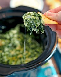 Crockpot Skinny Parmesan Spinach Dip is the perfect tailgate appetizer! Easy, healthy(er), and delicious! - The Cookie Rookie