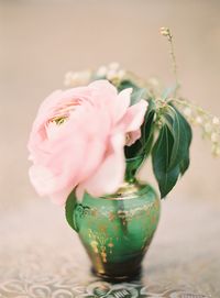 Love peonies.. most especially the blush pink contrasting with the emerald vase/gold detailing.