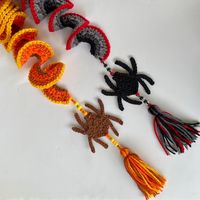 Celebrate fall with this quick and easy crochet spider wind spinner. Fun for Halloween or any autumn gathering, these work up quickly and make great gifts and incredible decoration for indoors or outdoors. They are really fun to make and the color combination possibilities are endless - these are a great use of scrap yarn, The detailed pattern is suitable for a beginner and is written using US crochet terminology with step by step instruction and over 30 photos.  Materials:  3-4 colors worsted w