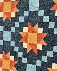 My Arctic Stars quilt pattern is now available ⭐️! This rich version is made with @benartex_fabrics new colors in the Cotton Shot collection by @amandamurphydesigns and I love the dark blue background so much! When you want to use solids that have texture, these are a perfect choice. 🧡 Comment STARS and I’ll send you the info for the pattern. ⭐️ #benarex #benartexambassador #createinspiredelight #arcticstarsquilt #seamssewmepatterns #quiltsofinsta #fallquilt Quilting by Cathy’s Quiltn Square