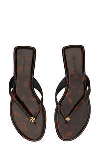 Signature logo hardware details the toe post of a versatile flip flop that will complement your warm-weather style. Flat sole Leather or synthetic upper/leather lining and sole Imported