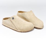 Meet the ultimate comfort slipper. This beauty features a suede lining and an    extra grippy outsole for added durability and traction, making it perfect for lounging indoors or venturing out. From Birkenstock.