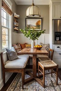 Maximize your small kitchen with a cozy breakfast nook by adding a cozy rug. Learn how to create a functional and inviting dining nook.