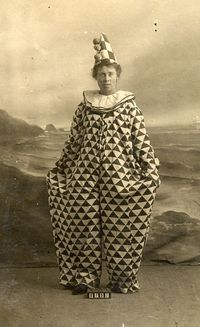 This vintage black and white photo of a clown is a studio cabinet card rather than a circus photo. “Cabinet cards” were a popular format for photographic portraiture from 1870 through the 1920's. Initially used for landscape views, they were later used for family portraits. Large enough to be easily viewed from across the room, they were typically displayed on a cabinet, hence the name "cabinet cards".
