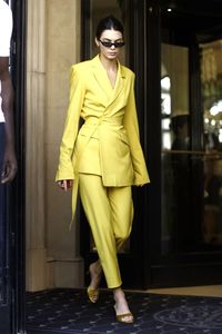 Kendall Jenner inspired our wardrobes with this yellow suit from House of Holland, when out in Paris.