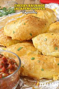 Cheesy Sausage Jalapeno Popper Empanadas are the perfect portable meal. This simple recipe is a fusion of jalapeno poppers and empanadas.