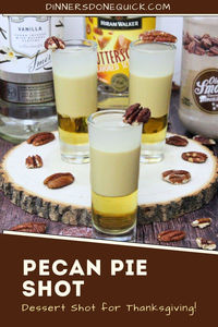 Serve up this sweet and festive Pecan Pie Shot at your Thanksgiving or holiday parties! Made with vanilla vodka, Ole Smoky butter pecan moonshine, and butterscotch schnapps, this layered shot captures the flavors of a classic pecan pie. It's the perfect dessert shot to impress your guests and toast the holiday season. Easy to prepare and even easier to enjoy, this is a must-have addition to your holiday drink lineup! #PecanPieShot #ThanksgivingCocktails #HolidayShots #DessertShots #FallCocktails