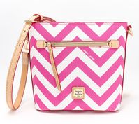 Make a bold style statement when you carry this coated cotton crossbody. With a distinct chevron pattern, all eyes will be on this bag. Plus, the slim profile makes it an easy option when you're traveling light. From Dooney & Bourke.