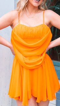 This "Here For Fun" dress will have you hopping around with joy! Stunning orange hue and fabulous cowl-front with open-back make it a "pick-me-up" you won't soon forget. So don't be a wallflower - get the party started with this totally fetching frock!