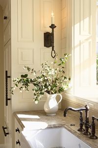 A simple vase with greenery fits right in to many interior design styles.