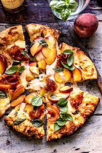 3 Cheese Prosciutto Peach Pizza: Tthe combination of sweet peaches, savory cheese, and salty prosciutto is always a summertime favorite!