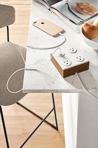 Our exclusive Verve charging station features elegant, solid wood and a fabric-wrapped cord for a sleek, modern look. The right-angle plug means you can plug Verve in behind the tightest spaces, and the optional smart USB port won’t overcharge and damage your devices. Verve is UL-listed and has tamper-resistant outlets to ensure the utmost safety.