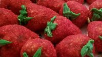 Beautiful cookies shaped and colored to look just like strawberries. Pefect for spring festivals and holidays.