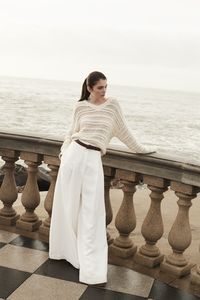 Discover the new nature-inspired capsule collection from Brunello Cucinelli which highlights organic textures in neutral hues. We love styling this chunky open-weave cotton sweater with wide-leg linen pants for the perfect white on white daytime ensemble.