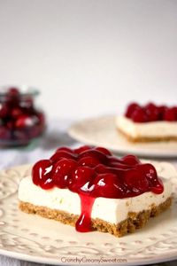 Cherry Delight - a dessert that's always a hit at parties and get-togethers. No-bake cheesecake layer topped with cherry pie filling makes this an irresistible treat!