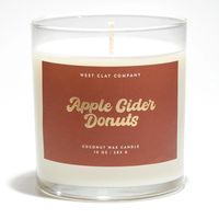 Apple Cider Donuts Coconut Wax Candle in a Glass JarBurn Time: 55-60 hours SCENT NOTES: Warm Spiced Apples, Sugary Donut Crumble & Cinnamon Vanilla Glaze The Vibe: Spicy + Gourmand + Delicious Say hello to our Apple Cider Donuts candle – the ultimate cozy vibe in a jar we keep bringing back! Imagine fresh, warm apple cider donuts straight from the bakery, with just the right amount of cinnamon sugar goodness. It’s like wrapping yourself in a fluffy blanket and treating yourself to a sweet fall i