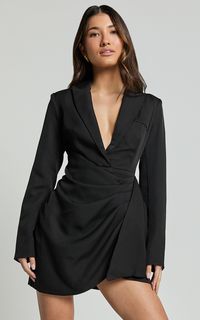 Get ready to turn heads in the Noni Mini Dress - your new go-to Blazer Wrap Dress in a classic Black that redefines the art of dressing up. Crafted for the woman who adores blending sophistication with a touch of playfulness, this dress is more than just an outfit it's a statement. Product Details: Wrap Blazer Dress Collar Neckline Party Perfect Mini Length Long Sleeve Polyester Fabric Size and Fit Size S / 8 length: 83cm / 32.68in Material and Care Polyester Low / No stretch