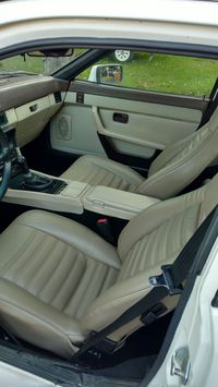 front interior during restoration.  Seats, door cards, dash finished. still lacks correct door pockets, shifter boot, carpet to be re-dyed dark brown to match door card accents and upper dash.