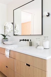 All natural, white bathroom with modern accents