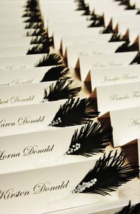 Wedding place cards Black & White feather and glass beads / rhinestones decor