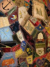 Crazy quilts - block by block - are little works of art. They often tell a story. In this case, this quilt from Utah (in the US) tells the story of pioneer women coming to the state in the 1800s. The quilt dates to ca.1893-1900.   Can you make out the log cabin, the bee skep, the church, the anchor, the bird? The list goes on as there's so much to look at.  The quilt is in the collection of the Utah Department of Heritage & Arts, but is no longer visible on their website.