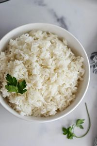 Easy and fool-proof Instant Pot Jasmine Rice is just minutes away! The Instant Pot does all the work, cooking rice that is moist, fluffy, and perfectly cooked. You simply need to measure the ingredients, set the timer, and fluff the jasmine rice when it's done.