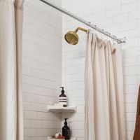 Logan Killen Interiors on Instagram: "A 1920’s bathtub with perfect curves, unlacquered brass hardware, rumbled 100% linen curtains, wood toilet seat, and loads of creamy subway tile from the local hardware store…a case for simplicity and restraint. We love creating bathrooms in historical buildings to look they have always been there, and to hopefully last for a long time to come. ⠀⠀⠀⠀⠀⠀⠀⠀⠀ Interior Design: @logankilleninteriors Architecture: @zangarapartners General Contractor: @entablaturenola Stylist: @jo.gremillion Photography: @jmarquephoto ⠀⠀⠀⠀⠀⠀⠀⠀⠀ ⠀⠀⠀⠀⠀⠀⠀⠀⠀"