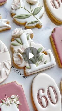 Jessica on Instagram: "🌸Okay, last floral design from the 60th birthday set of cookies. I had plans to deviate and incorporate different types of florals throughout this order—- but I clearly enjoyed this design and decided not to over complicate things (a rarity 😅). I kept these cookies super neat and clean to try and match the birthday lady’s fun and elegant personality, and it resulted in such a cohesive set that I positively adore! Side note - I’m a little picky when it comes to cookie cutters, and @6bittersweets gets it! Her collection of letter cutters is perfect! The floral and greenery embellishments are so perfectly placed and maintain the integrity of delicate and slender letters, like this letter “L.” 10/10 recommend. 💯 . . . . . . . #cookies #sugarcookies #sugarcookiesofinst