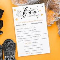 A soon-to-be mom will love this watercolor Halloween design. This design features "boo" in a handwritten font with watercolor Halloween icons.