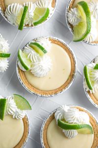 Craving something sweet? These Mini Key Lime Pies are fun to make and oh so delicious! Mini graham cracker crusts make this easy dessert a breeze to make!