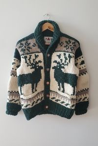 100% Wool Cowichan Collared Reindeer Sweater. Made in Canada by 'FAB' Canadian maple leaf inlaid wood buttons.  Pit to pit: 19.5 inch Length: 23 inch  Super thick and soft, great vintage condition!!