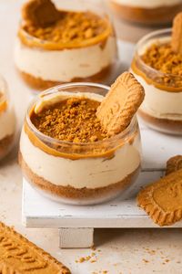 No-Bake Biscoff Cheesecake Cups layered with a buttery lotus cookie base, a creamy Biscoff cheesecake filling, and topped with a generous layer of cookie butter. This decadent dessert is super easy to make with just