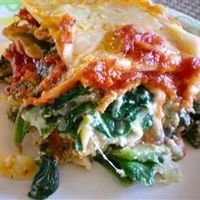 Fresh spinach and plenty of ricotta, Romano and mozzarella make this a cheesy and hearty vegetarian dish. This lasagna can also be made without the spinach.