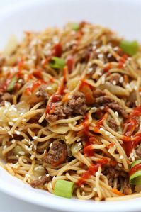 Instant Pot Hoisin Beef Noodles--skinny noodles, ground beef, cabbage, carrots and onions lightly coated with hoisin and soy sauce and then topped with sesame seeds and green onions. An easy one pot meal that has amazing flavor!