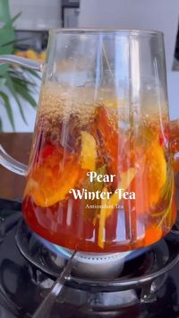 2 pears Ginger Fresh turmeric Cranberries Mint leaves Lemon Cinnamon Star anise Rosemary Water 2 tea bags  Add all the ingredients listed to a tea pot. Bring ingredients to a boil for a couple minutes! Serve hot and enjoy. No need to add any sweetener as the pears add natural sweeteness to the tea.