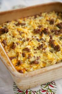 Sausage Hash Brown Breakfast Casserole - hash browns, sausage, eggs & cheese - can be made ahead of time and refrigerated or frozen until ready to bake! Great for overnight guests and Christmas morning!