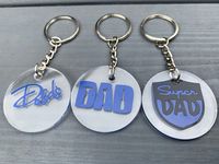 A perfect gift for Fathers Day, Birthday or just to say I love you!  A small acrylic circle ( 0.12inchs in thickness and 1.5 inches approx) attached to a silver keychain.  Designs  - Dads Day - Dad (Tools)  - Super Dad  - Dog Dad ( You can add a name whether its dads name or the dogs name to this, please add to the Personalisation box ) - I remember for my dad ( Please message me for custom designs before placing an order if you have a certain sign or wording you wanted to use instead in honour